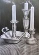 Three candles and holders